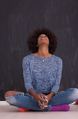 Image showing African American woman isolated on a gray background