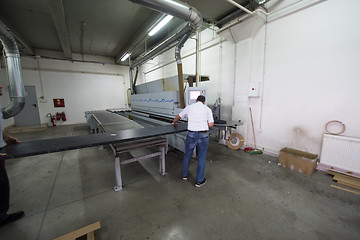 Image showing workers in a factory of wooden furniture