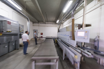 Image showing workers in a factory of wooden furniture