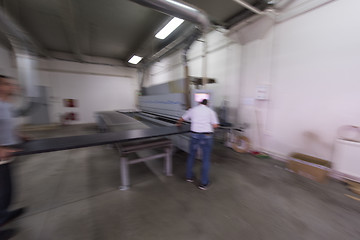 Image showing workers in a factory of wooden furniture