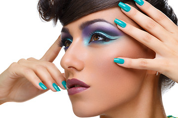 Image showing Beautiful girl with bright vivid purple make-up 