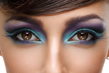 Image showing Beautiful girl with bright vivid purple make-up 