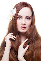 Image showing Beautiful girl with long red brown hair