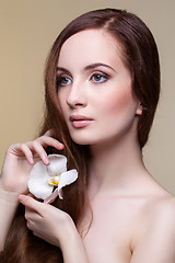 Image showing Beautiful girl with long red brown hair