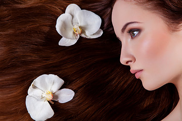 Image showing Beautiful girl with long red hair