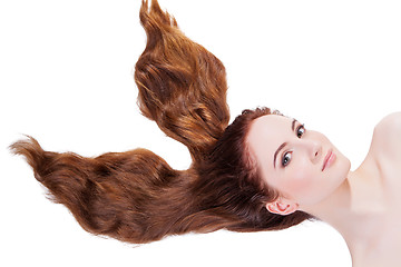 Image showing Beautiful girl with long red hair