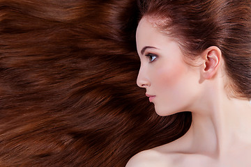 Image showing Beautiful girl with long red hair