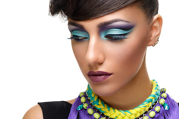 Image showing Beautiful girl with bright vivid purple make-up 