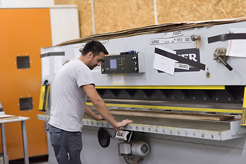 Image showing worker in a factory of wooden furniture