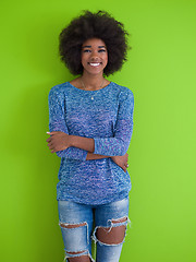 Image showing black woman isolated on a Green background