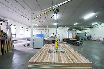 Image showing worker in a factory of wooden furniture