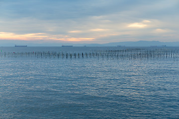 Image showing Fish farm with sunset