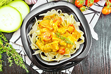 Image showing Pasta with goulash in plate on board top