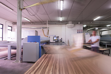 Image showing worker in a factory of wooden furniture