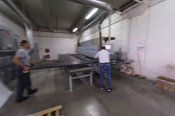 Image showing workers in a factory of wooden furniture