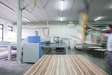 Image showing worker in a factory of wooden furniture