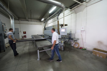 Image showing workers in a factory of wooden furniture