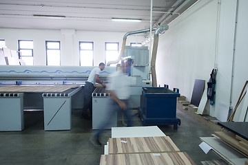 Image showing workers in a factory of wooden furniture