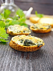 Image showing Sandwich of nettle on dark board