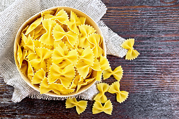 Image showing Farfalle in bark box on board top