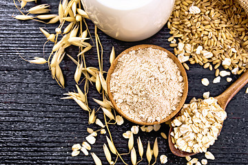 Image showing Flour oat in bowl on wooden board top