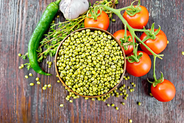 Image showing Mung beans  in bowl with vegetables and thyme on board top