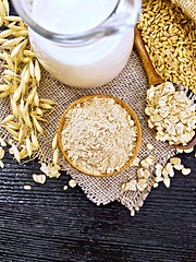 Image showing Flour oat in bowl on board top