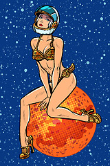 Image showing pin up girl. Attractive sexy astronaut woman alien in a futuristic retro costume