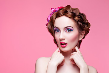 Image showing Beautiful girl with bright make-up and pink hat