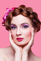 Image showing Beautiful girl with bright make-up and pink hat