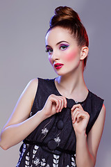 Image showing Beautiful girl with hairdo and bright make-up