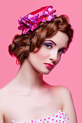 Image showing Beautiful girl with bright make-up and pink hat