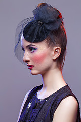 Image showing Beautiful girl with hairdo and bright make-up