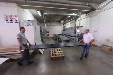 Image showing workers in a factory of wooden furniture