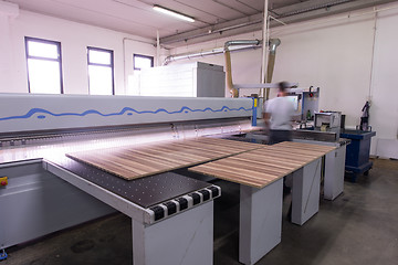 Image showing worker in a factory of wooden furniture