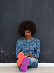 Image showing Happy African American Woman Using Digital Tablet