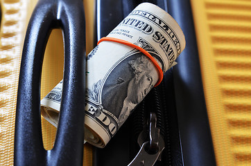 Image showing Suitcase with US Dollar banknotes