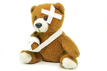 Image showing Injured teddy bear with bandages