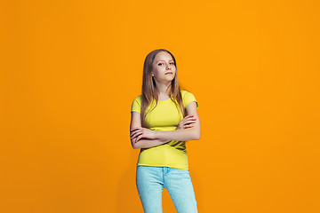 Image showing Young serious thoughtful teen girl. Doubt concept.