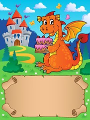 Image showing Small parchment and dragon holding cake