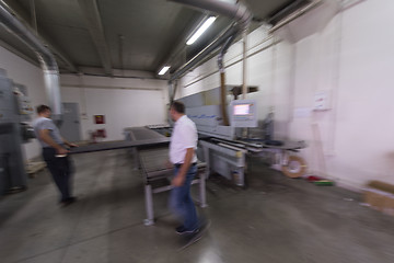 Image showing workers in a factory of wooden furniture