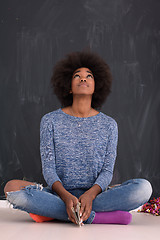 Image showing African American woman isolated on a gray background