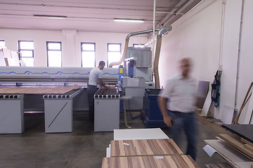 Image showing workers in a factory of wooden furniture