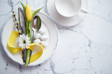 Image showing Spring Easter Table setting at white marble table. Top view