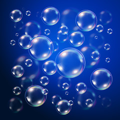 Image showing Transparent bubbles over dark blue