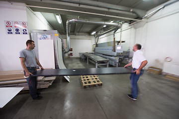 Image showing workers in a factory of wooden furniture