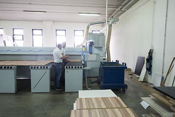 Image showing workers in a factory of wooden furniture