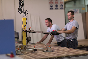 Image showing workers in a factory of wooden furniture