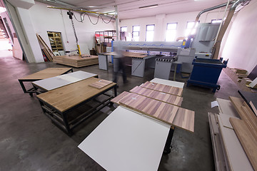 Image showing worker in a factory of wooden furniture