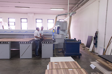 Image showing workers in a factory of wooden furniture